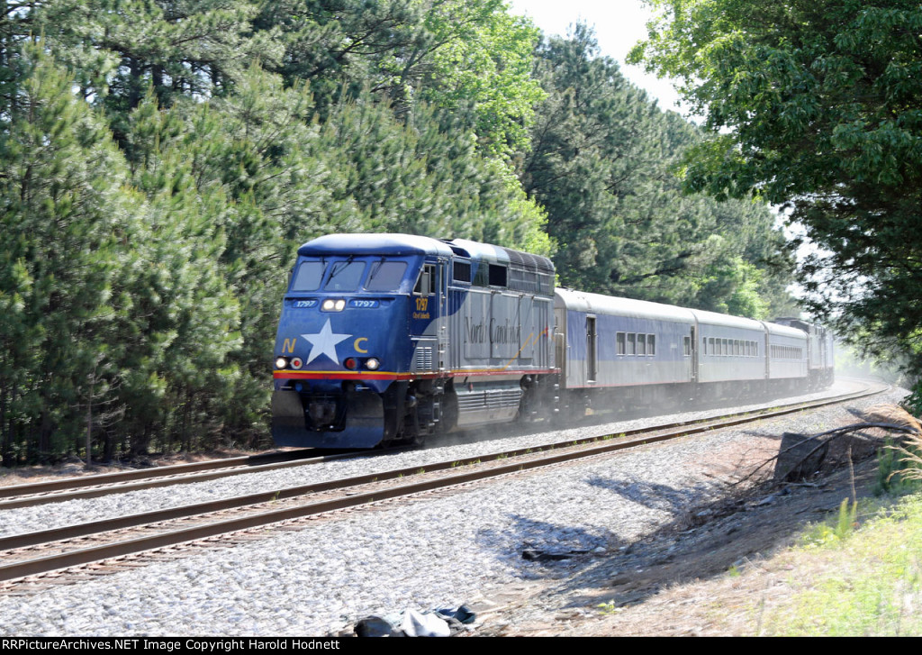 RNCX 1797 kicks up dust from the fresh ballast (and pollen)